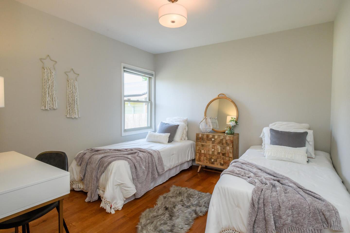 138 Channing Road Burlingame, CA 94010 - Photo 23 of 36 a bedroom with two beds and a window