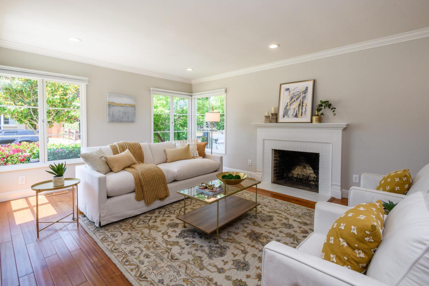 138 Channing Road Burlingame, CA 94010 - Photo 3 of 36 a living room with furniture and a fireplace