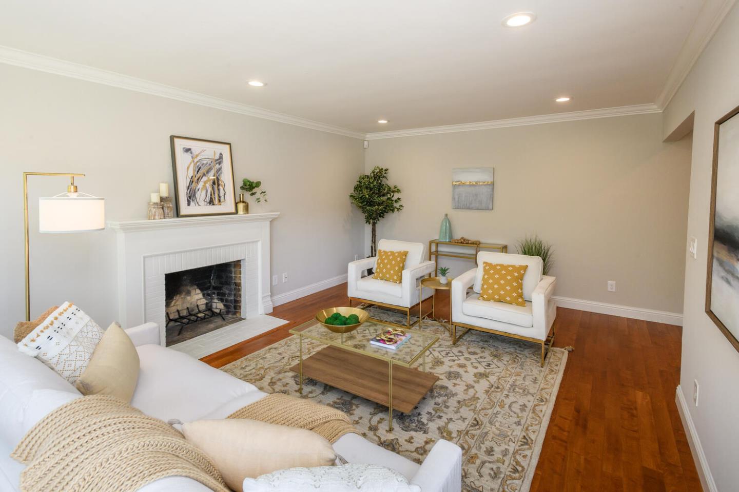 138 Channing Road Burlingame, CA 94010 - Photo 5 of 36 a living room with furniture and a fireplace