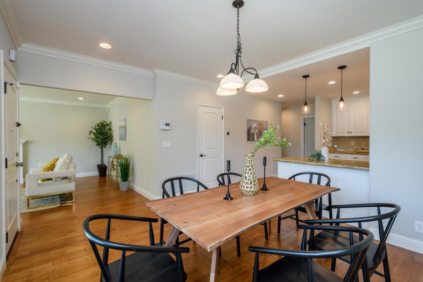 138 Channing Road Burlingame, CA 94010 - Photo 7 of 36 a view of a dining room with furniture and wooden floor
