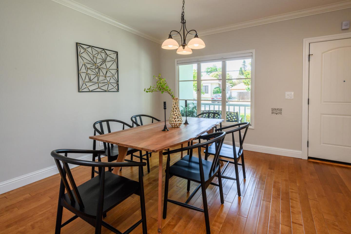 138 Channing Road Burlingame, CA 94010 - Photo 9 of 36 a view of a dining room with furniture window and wooden floor