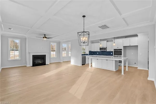 $600,000 | 8607 Lemur Lane, Summerfield, NC 27358