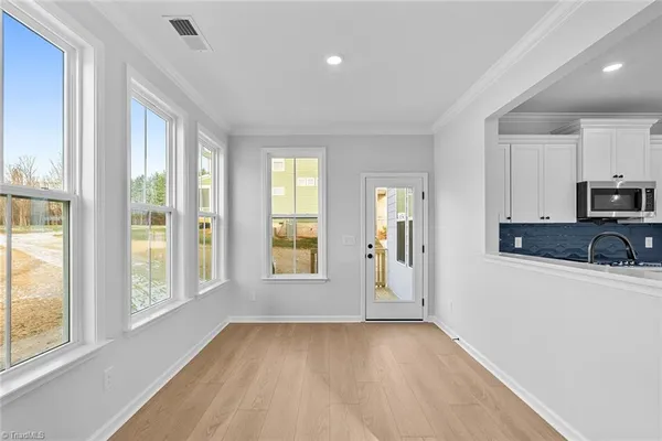 $600,000 | 8607 Lemur Lane, Summerfield, NC 27358