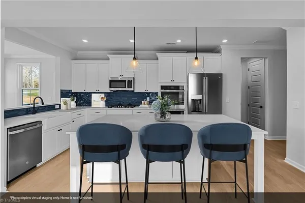 $600,000 | 8607 Lemur Lane, Summerfield, NC 27358