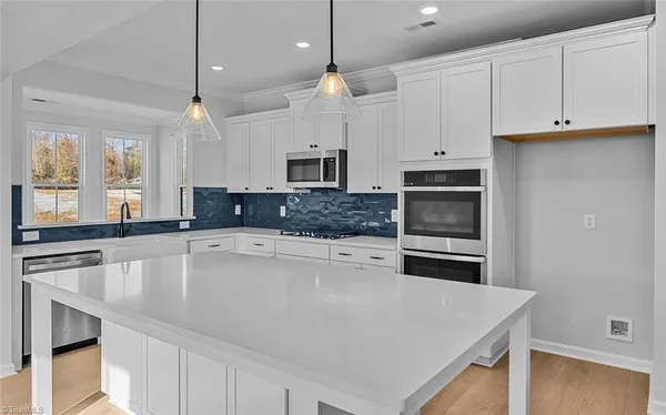 $600,000 | 8607 Lemur Lane, Summerfield, NC 27358