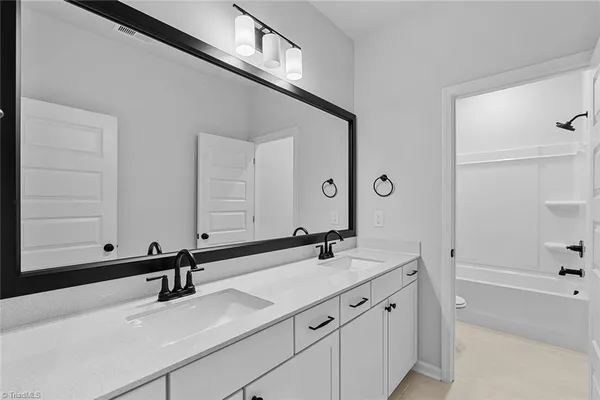 $600,000 | 8607 Lemur Lane, Summerfield, NC 27358