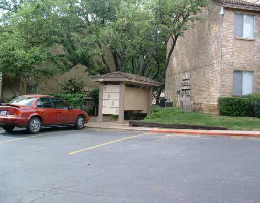 8210 Bent Tree Road, Unit 149 Austin, TX 78759 - Photo 1 of 1 a view of a car parked in back of a house