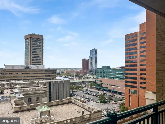a view of a city with tall buildings