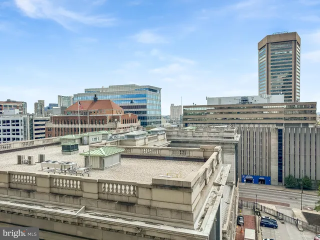 a view of a balcony with city view
