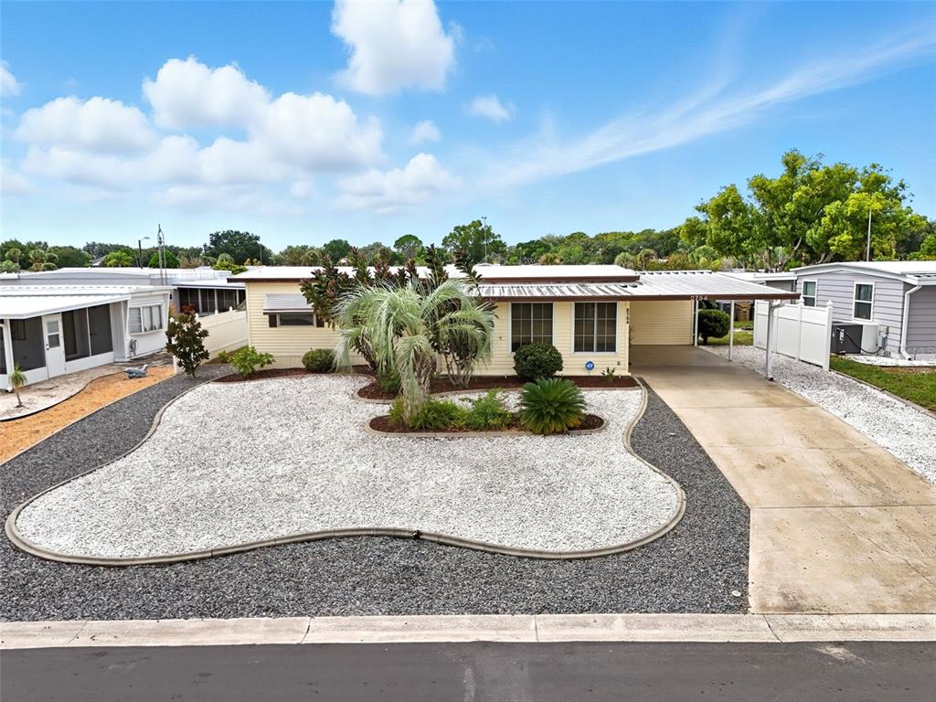 2754 Vindale Road Tavares, FL 32778 - Photo 1 of 1 a view of a house with a patio