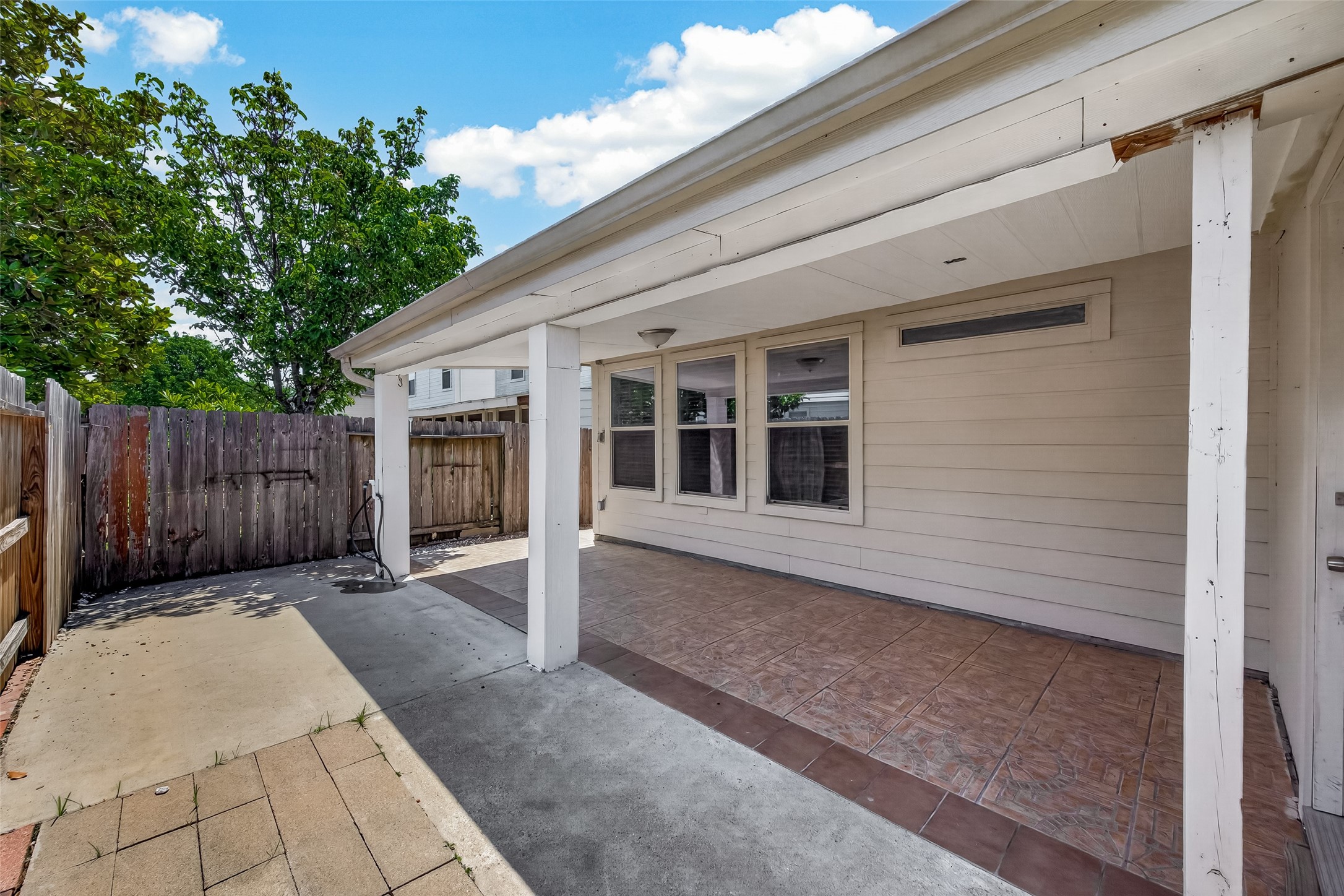 19322 Dawn Canyon Road Houston, TX 77084 - Photo 35 of 37 Covered patio area with tiled flooring,