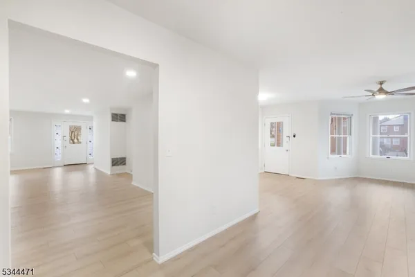 a view of a livingroom with wooden floor