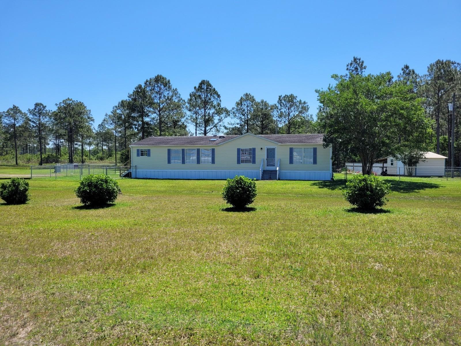 12904 Ridgeland Road Vancleave, MS 39565 - Photo 2 of 33 Front of home