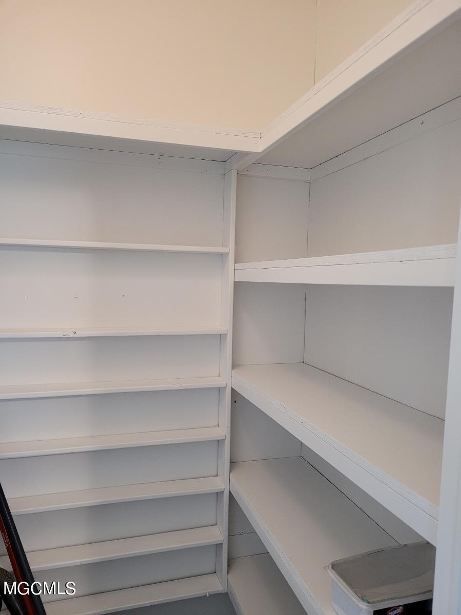 12904 Ridgeland Road Vancleave, MS 39565 - Photo 23 of 33 Closet shelving and racks