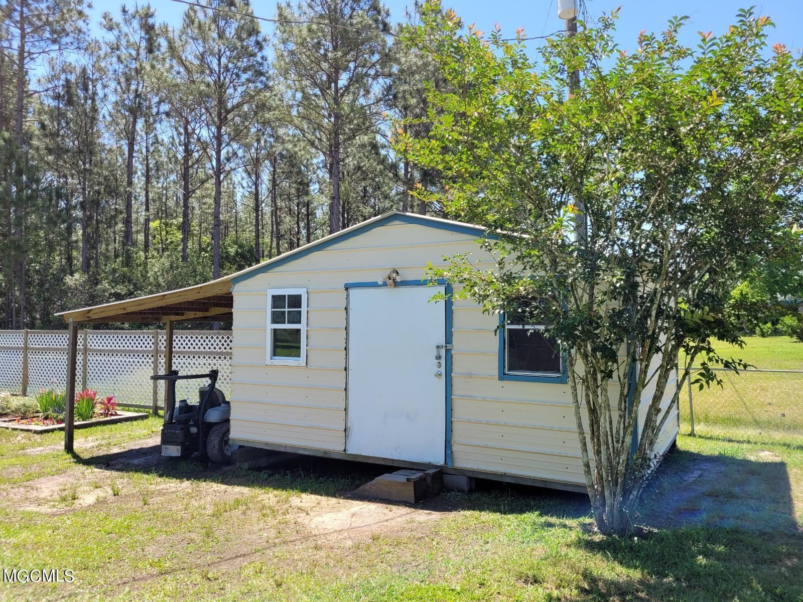 12904 Ridgeland Road Vancleave, MS 39565 - Photo 5 of 33 Shed in back