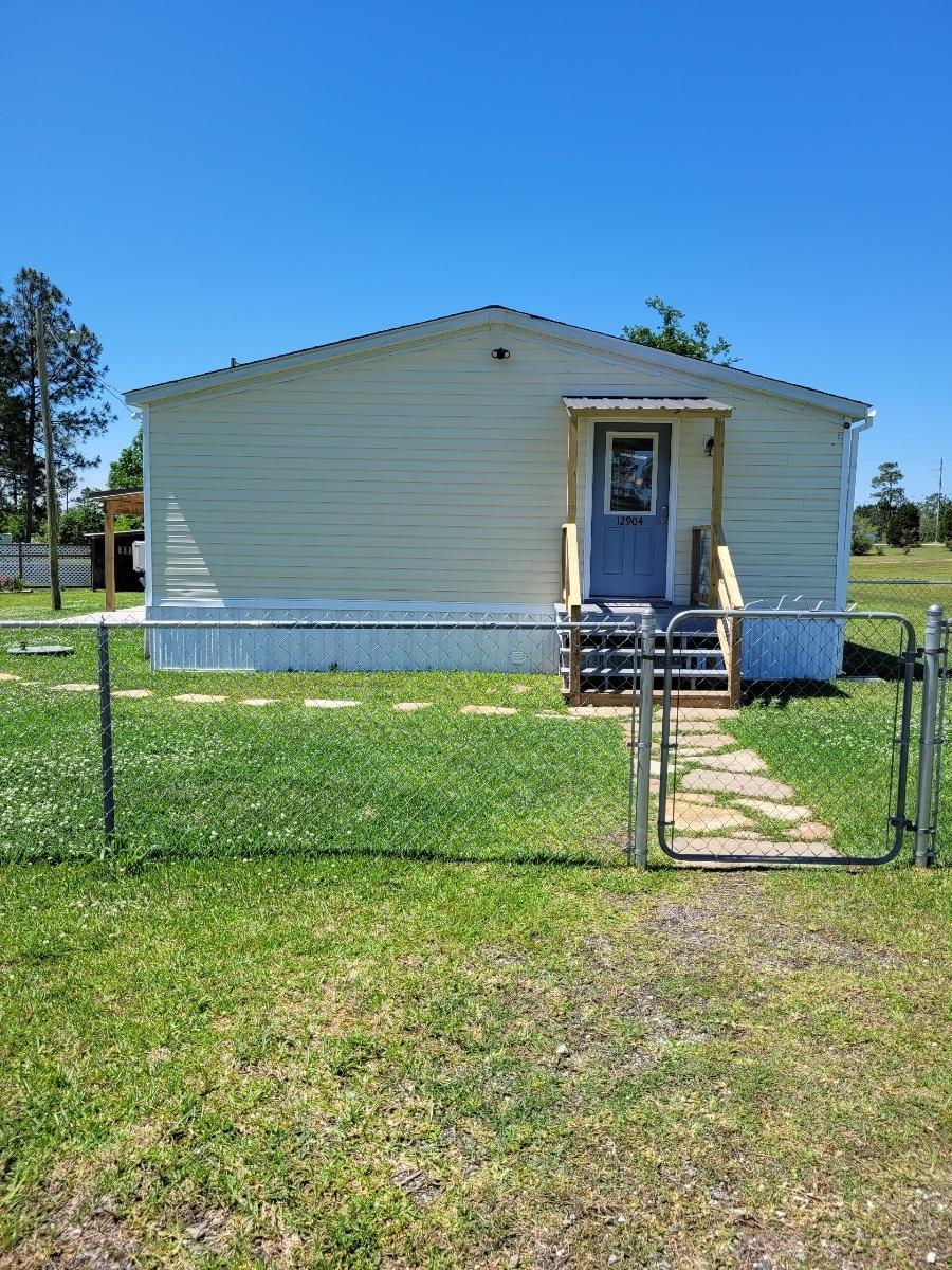 12904 Ridgeland Road Vancleave, MS 39565 - Photo 6 of 33 walk in side of home