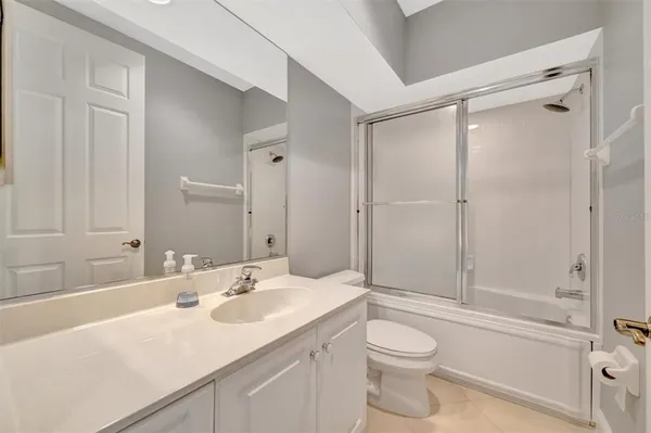 a view of a swimming pool with a outdoor seating