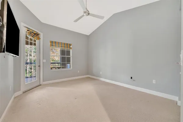 a view of a swimming pool with a patio