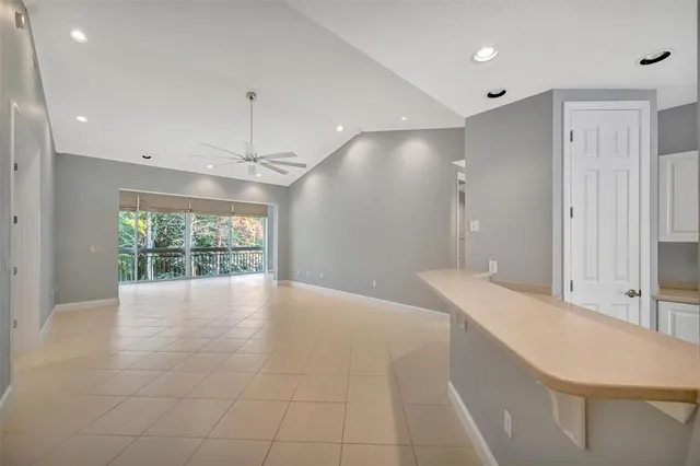 a view of an empty room with a large window