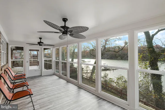 a kitchen with stainless steel appliances a stove a sink and a microwave
