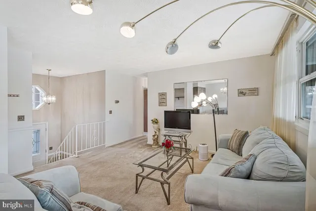 a kitchen with a sink a cabinets and window
