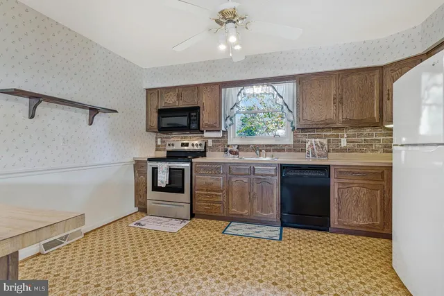 a bed room with a bed and window