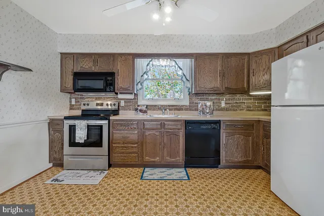 a view of a balcony with wooden floor