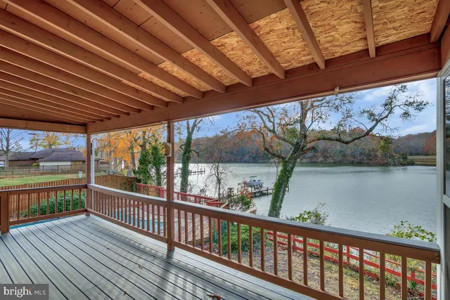 a bathroom with a sink toilet and mirror