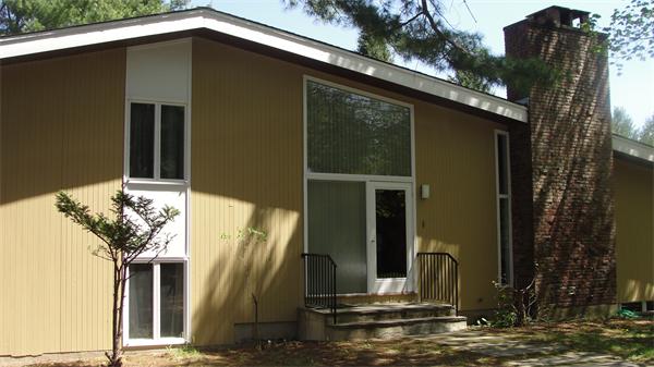 367 Conant Road Weston, MA 02493 - Photo 1 of 22 a front view of a house with a yard
