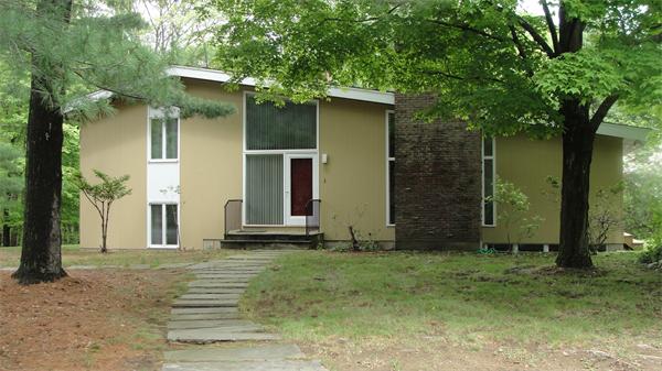 367 Conant Road Weston, MA 02493 - Photo 21 of 22 a front view of a house with garden