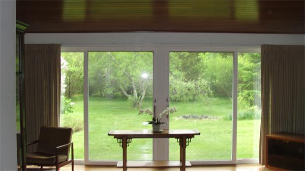 367 Conant Road Weston, MA 02493 - Photo 8 of 22 a view of a garden from a window