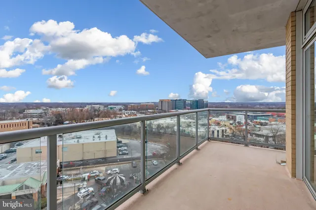 a view of a balcony with city view