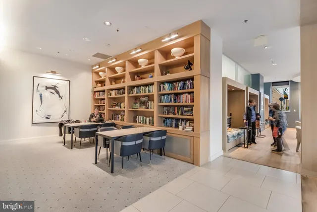 a view of a workspace with furniture