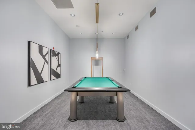 a room with workspace and window