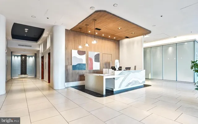 a view of living room with furniture and flat screen tv