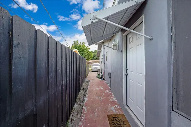 a view of a pathway of a wooden building