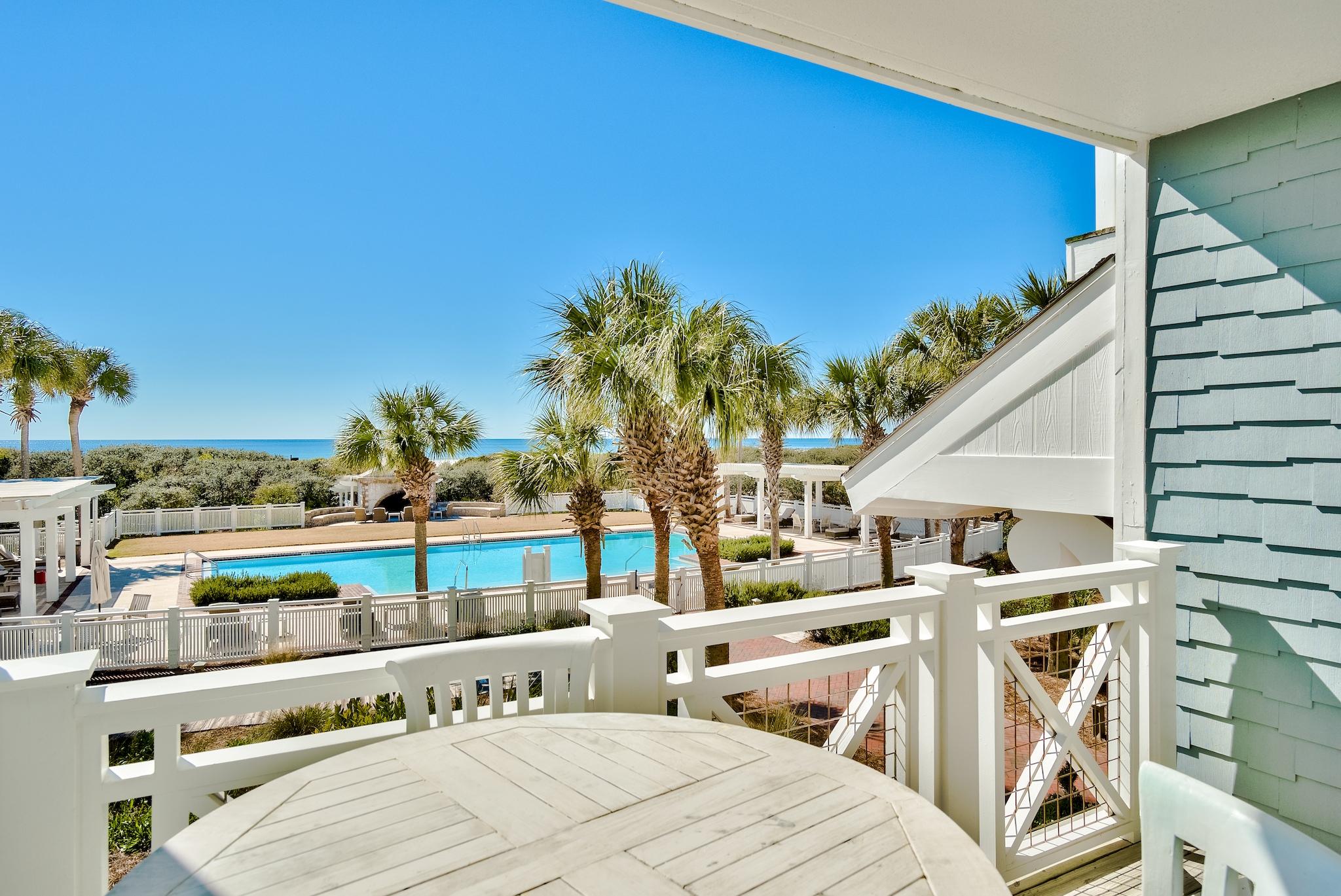 337 Bridge Lane, Unit B102 Watersound, FL 32461 - Photo 1 of 41 a view of a balcony with chairs