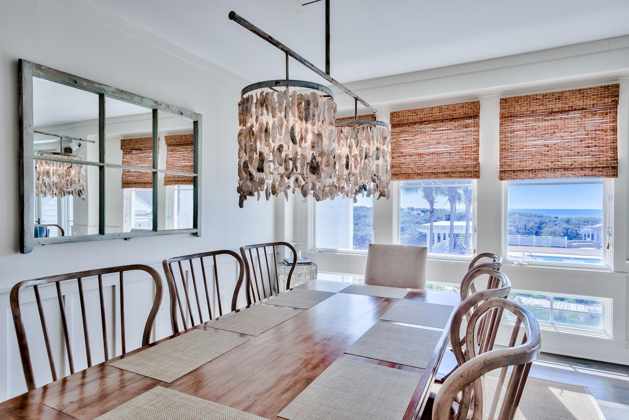 337 Bridge Lane, Unit B102 Watersound, FL 32461 - Photo 10 of 41 a view of a dining room with furniture window and outside view