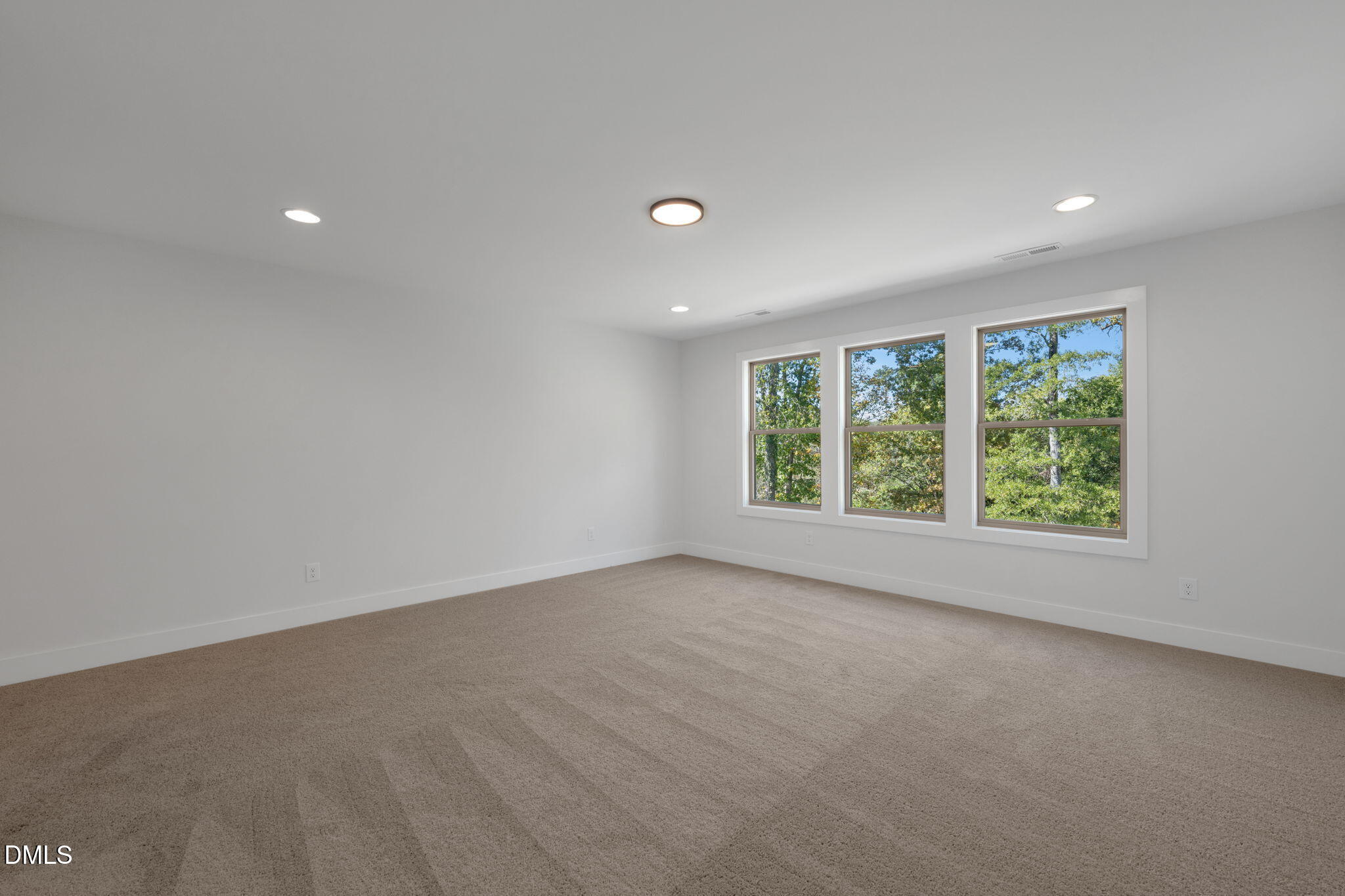 966 Double Helix Road Apex, NC 27523 - Photo 26 of 36 a view of an empty room with a window