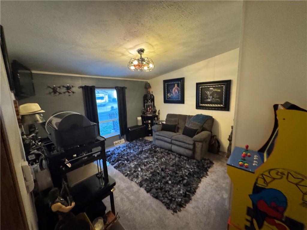 505 Amy Lane Rochester, PA 15074 - Photo 12 of 22 a living room with furniture and a flat screen tv