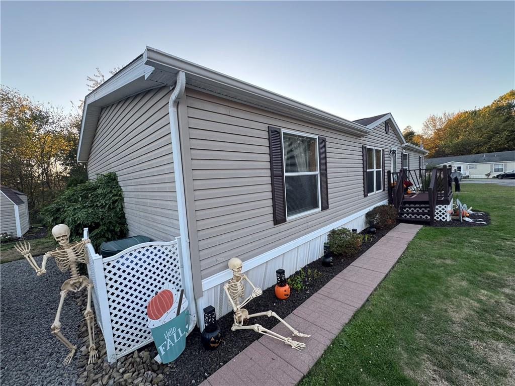 505 Amy Lane Rochester, PA 15074 - Photo 2 of 22 a front view of a house with garden