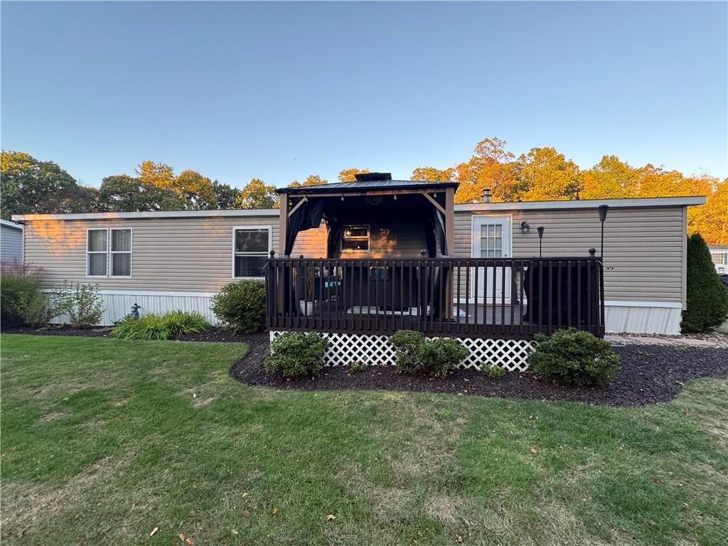 505 Amy Lane Rochester, PA 15074 - Photo 3 of 22 a view of a deck in front of house with wooden fence