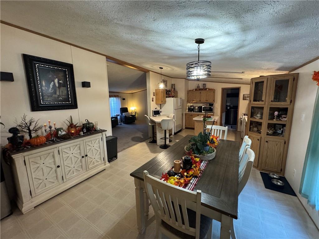 505 Amy Lane Rochester, PA 15074 - Photo 9 of 22 a living room with furniture and a chandelier