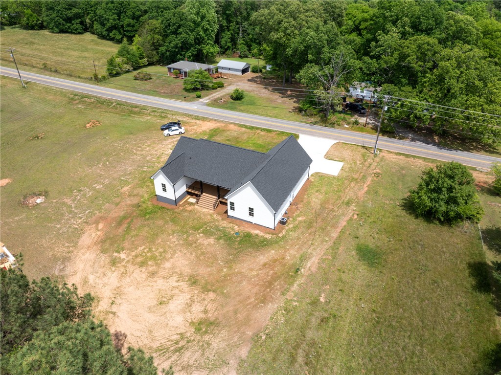 1735 Maw Bridge Road Central, SC 29630 - Photo 34 of 38 Perched on a verdant lot, this pristine new construction home offers a tranquil countryside retreat.