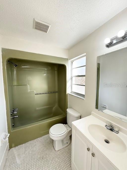 1221 Kennedy Road, Unit 48 Daytona Beach, FL 32117 - Photo 12 of 12 a bathroom with a sink toilet and shower