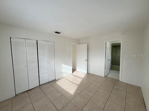 1221 Kennedy Road, Unit 48 Daytona Beach, FL 32117 - Photo 10 of 12 a view of a room with an empty space