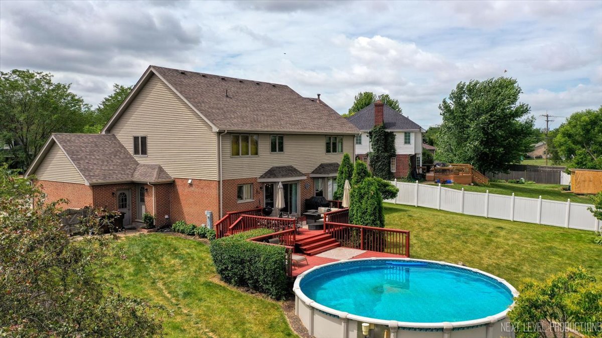 1285 O'Connell Circle New Lenox, IL 60451 - Photo 38 of 42 a front view of house with yard outdoor seating and barbeque oven