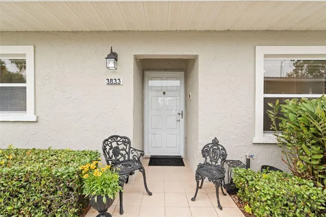 a couple of table and chair in the patio