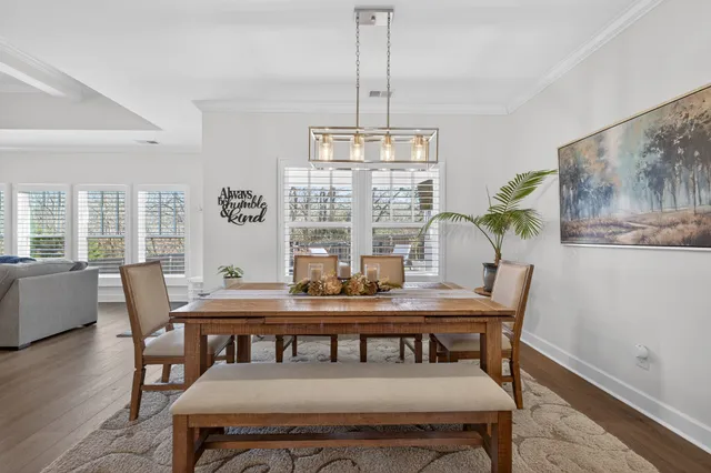 a spacious bedroom with a large bed and a large window