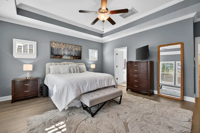 a view of hallway with livingroom and furniture